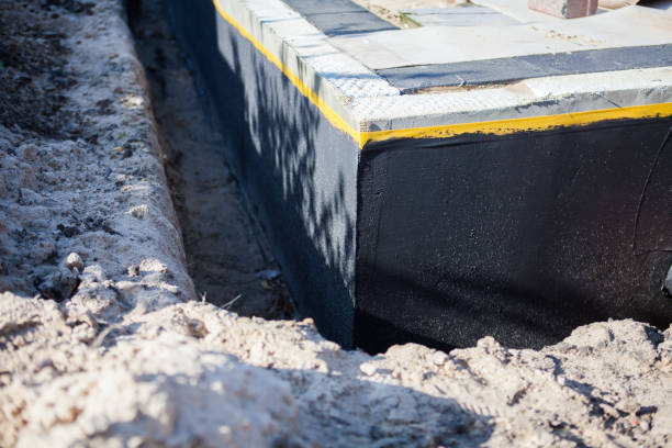Professional Waterproofing technician working in Farmersburg, IN